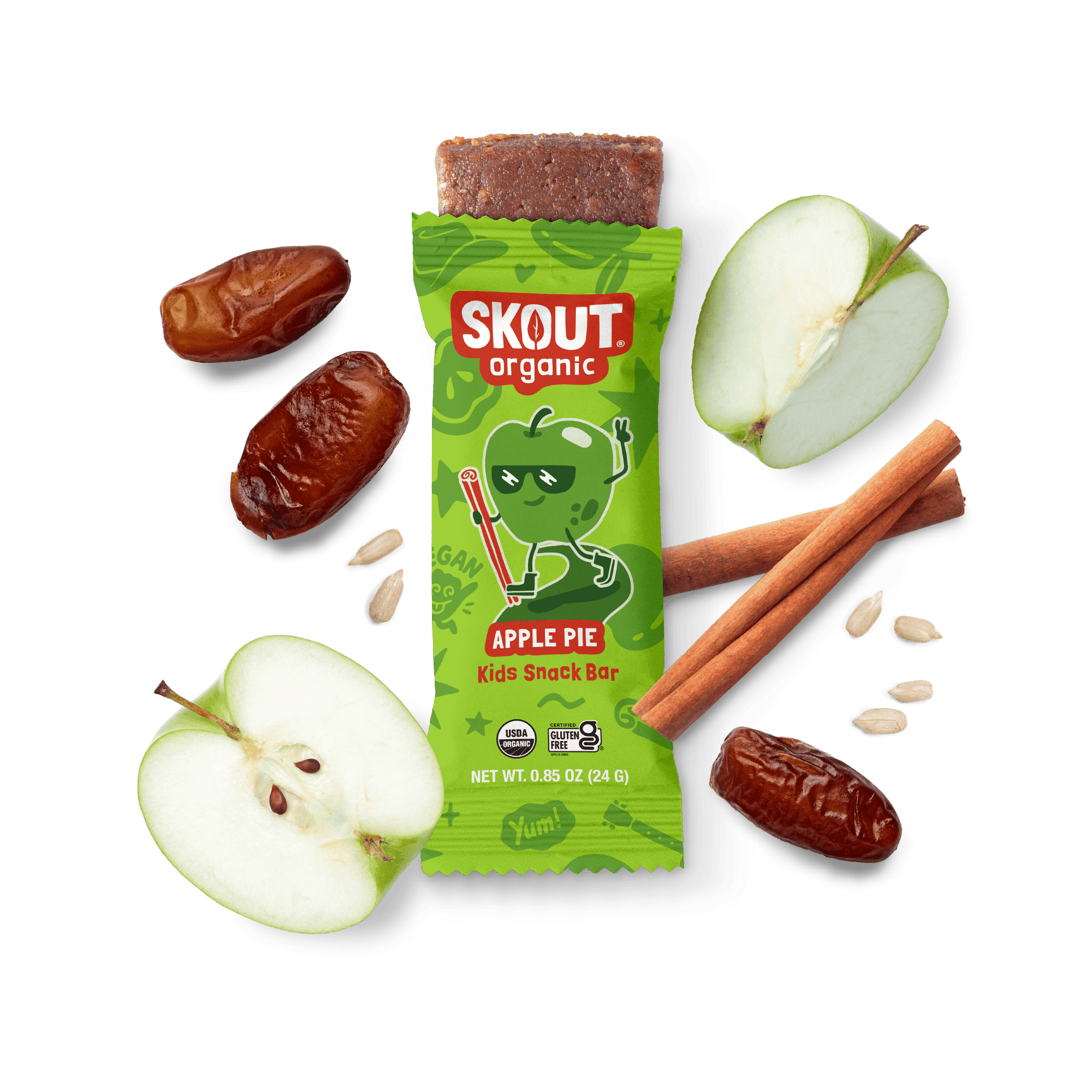 Skout Organic Apple Pie Kids Snack Bar in an open wrapper, surrounded by dates, apples, and cinnamon sticks.