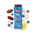 Skout Organic Blueberry Blast Kids Snack Bar in an open wrapper, surrounded by dates, blueberries, and a lemon wedge.