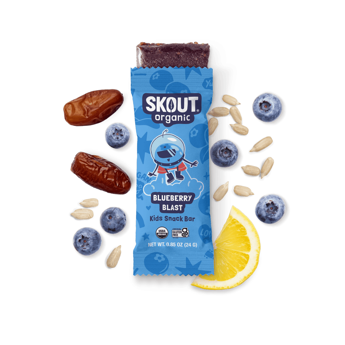 Skout Organic Blueberry Blast Kids Snack Bar in an open wrapper, surrounded by dates, blueberries, and a lemon wedge.