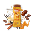 Skout Organic French Toast Kids Snack Bar in an open wrapper, surrounded by dates, coconut, cinnamon sticks, vanilla, and maple syrup.