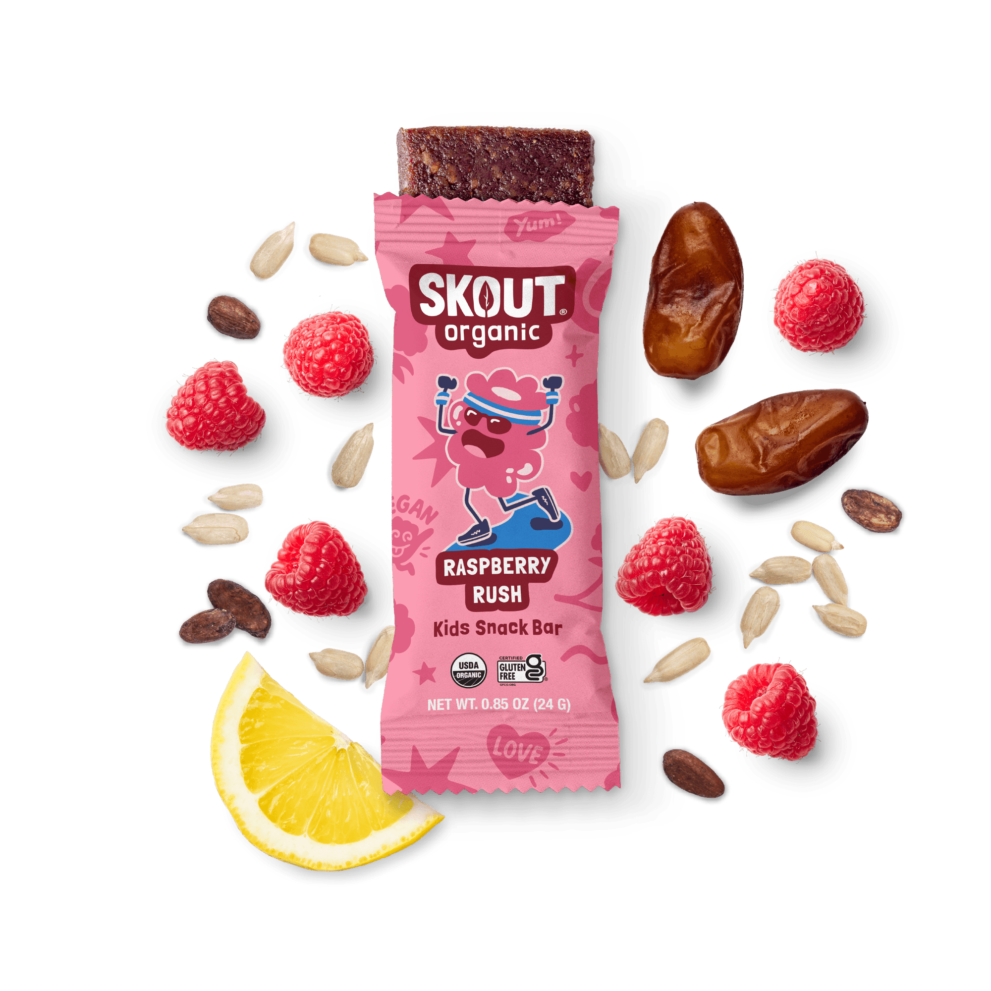 Skout Organic Raspberry Rush Kids Snack Bar in an open wrapper, surrounded by dates, raspberries, and a lemon wedge.
