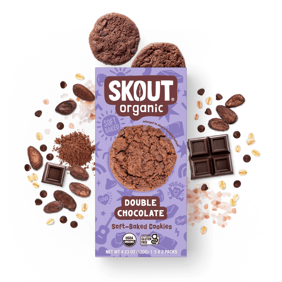 Skout Organic Double Chocolate Soft-Baked Cookies in an open box, surrounded by cocoa powder and chocolate chips.