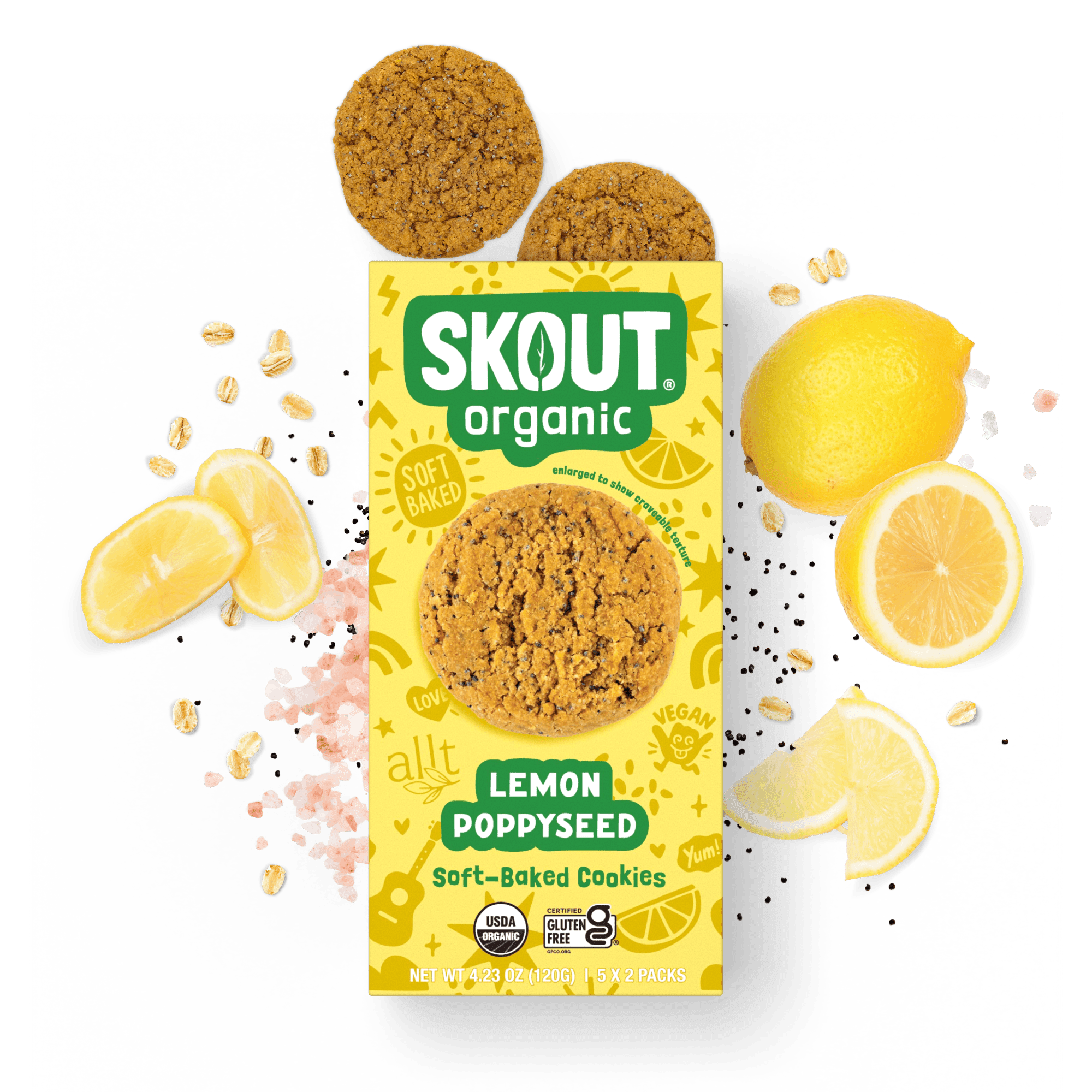 Skout Organic Lemon Poppyseed Soft-Baked Cookies in an open box, surrounded by lemon slices and poppy seeds.