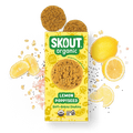 Skout Organic Lemon Poppyseed Soft-Baked Cookies in an open box, surrounded by lemon slices and poppy seeds.