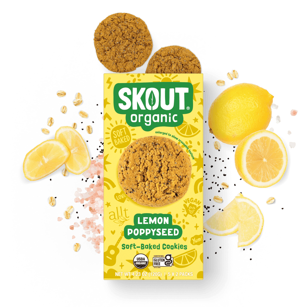 Skout Organic Lemon Poppyseed Soft-Baked Cookies in an open box, surrounded by lemon slices and poppy seeds.