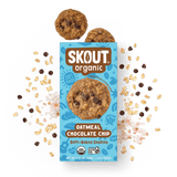 Skout Organic Oatmeal Chocolate Chip Soft-Baked Cookies in an open box, surrounded by oats and chocolate chips.