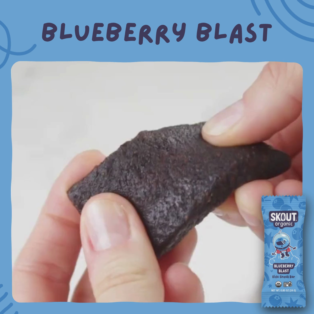 Close-up of a Blueberry Blast Kids Snack Bar being pulled apart to show its soft, chewy interior.